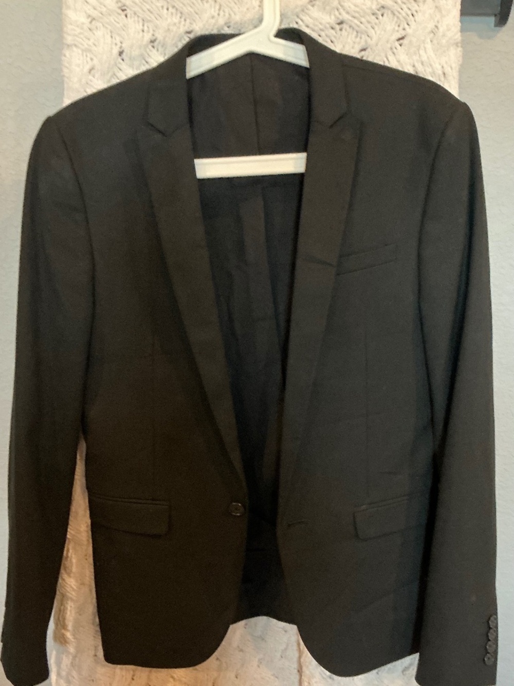 Men’s black suit jacket
